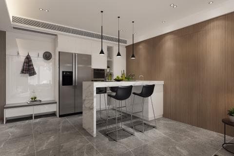 這張照片是現代化的廚房，裡面有一個白色大理石吧檯，上面有三個黑色吧檯椅。