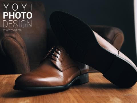 這張「皮鞋」的照片是展示了一雙棕色皮鞋，皮鞋的鞋底是黑色的。