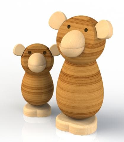 這張照片是兩隻木頭猴子，一隻比較大，一隻比較小，它們都是用木頭做的，看起來很可愛。
