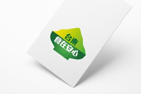 這張照片是綠色和黃色的碗狀圖案，上面寫著“臺積電”三個字。