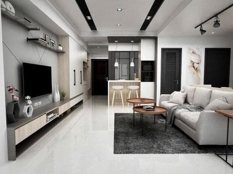 這張「現代風格客廳」的照片是，牆上掛著電視、下方有電視櫃，沙發在客廳正中央，兩張茶几放在沙發前面，客廳裡還有很多綠色植物。