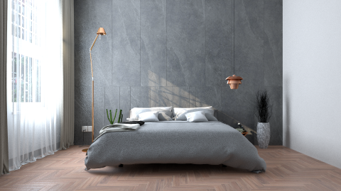 這張照片是一間現代化的臥室，最重要的是房間中間的床。床鋪上鋪著灰色的床單和枕頭，看起來非常舒適。