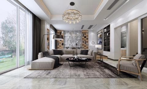 這張照片是一間現代化的客廳，其中最重要的是舒適的沙發，它位於房間的中心，並配有柔軟的靠墊，讓人感到放鬆和舒適。