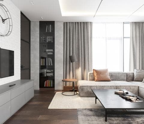 這張「現代簡約客廳」的照片是一個寬敞的空間，有灰色沙發，深色木地板，以及一個玻璃櫃和一個黑色的茶几。牆上掛著一個電視，旁邊有一個白色的儲物櫃。房間裡還有落地窗和灰色窗簾。
