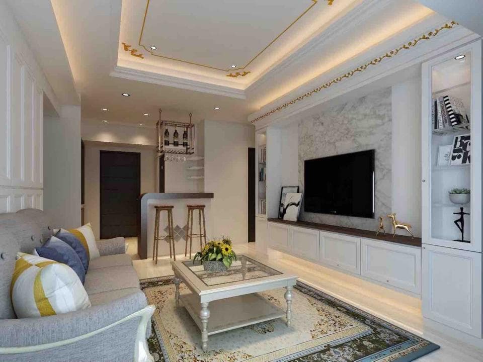 這張照片是 一個裝潢精美且時尚的客廳,有著白色牆面和天花板,以及一個大型電視牆,電視牆上裝飾著白色大理石牆面和一個大型平板電視。