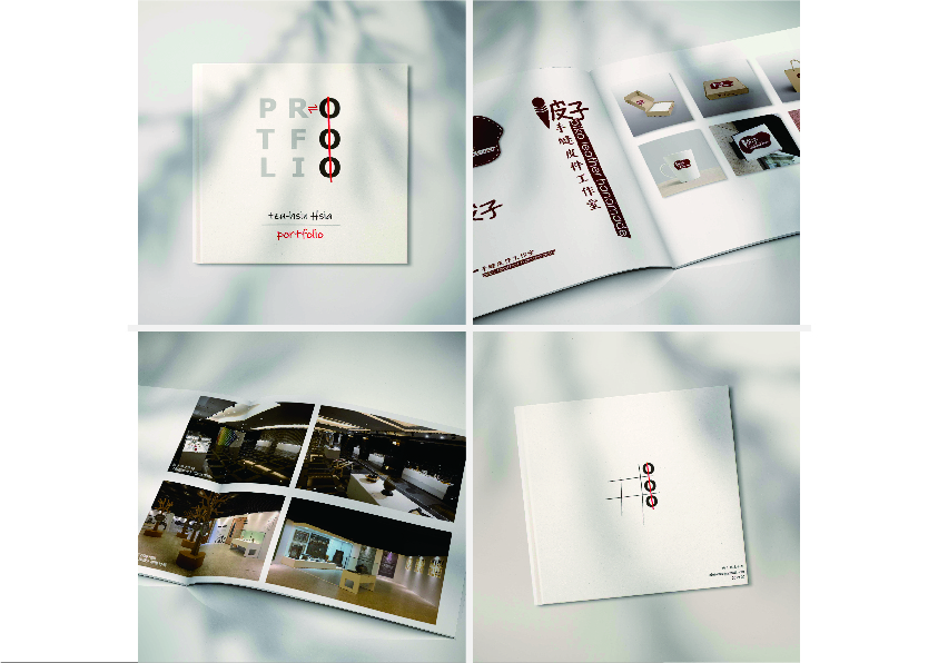 這張照片是一個設計作品集的封面,上面用紅色的字體寫著“PROTFOLIO”。