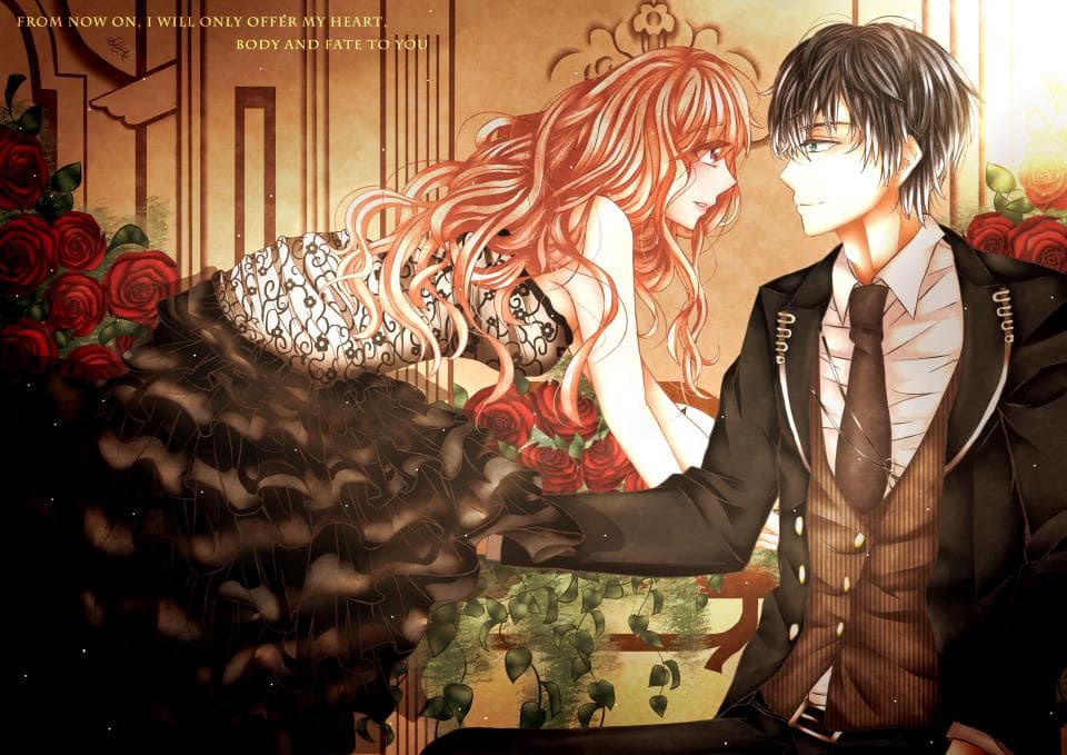 這張照片是一對情侶,男生穿著西裝,女生穿著黑色蕾絲禮服,他們眼神交會,充滿愛意。