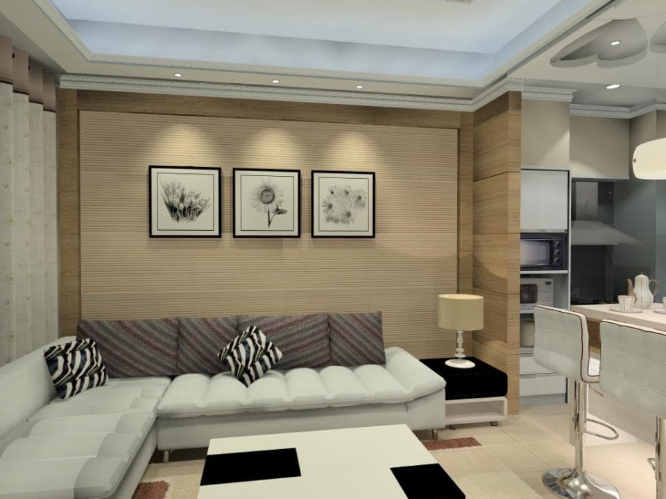 這張「客廳」的照片是一個現代化的客廳,有一個白色的沙發,牆壁上掛著三幅黑白畫。沙發前有一個茶几。