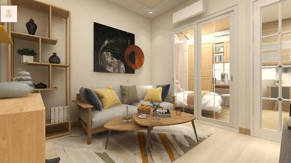 這張「客廳」的照片是一張現代化的客廳,裡面有一張沙發、一個咖啡桌,還有兩張書架。客廳的牆壁是白色的,地上鋪著木地板,看起來非常舒適。客廳裡有一個大窗戶,可以讓陽光照進來。