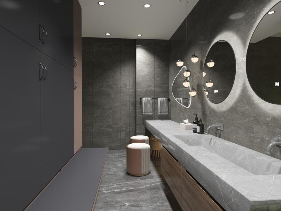 這張照片是一個現代化的浴室,最重要的是設計精美的石材洗臉臺,配備雙水槽和拋光金屬水龍頭,呈現出奢華感。