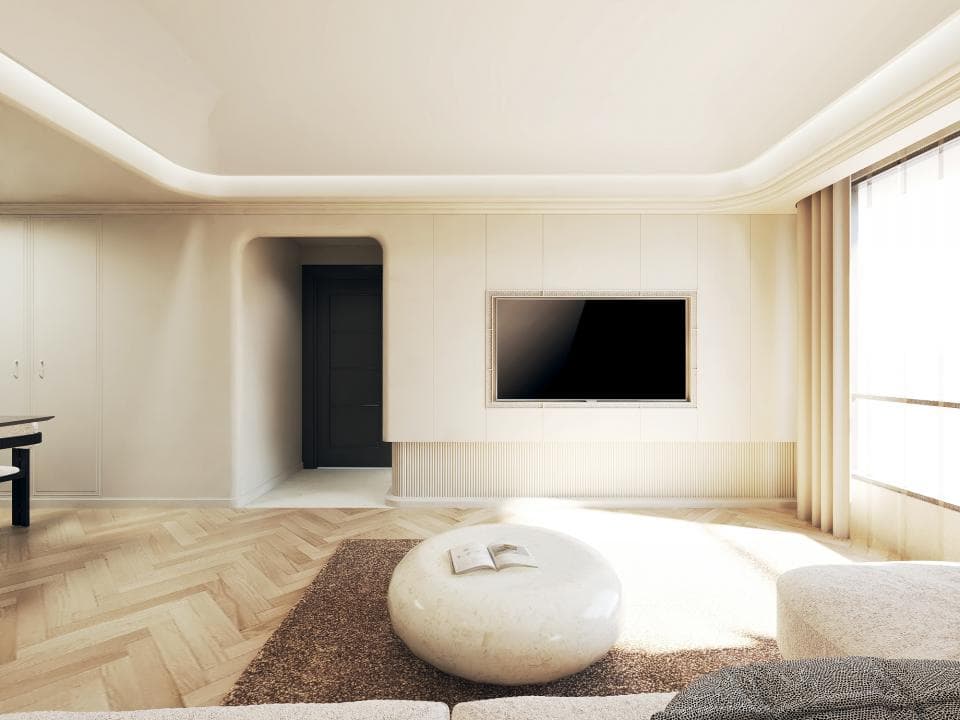 這張客廳的照片是一間簡約的現代風格客廳,牆壁和天花板都是淺色,房間裡有一個大窗戶,陽光灑落在客廳地板上,看起來明亮而舒適。