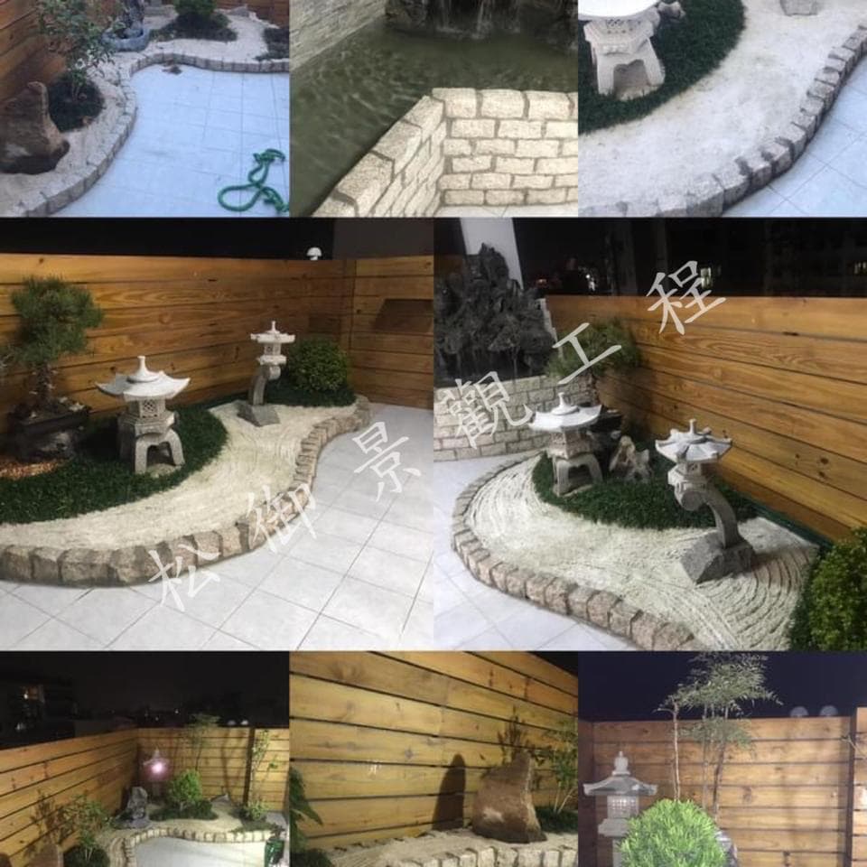 這張照片是一個日式庭園,最重要的是中間的石頭路徑,路徑兩旁種滿了綠色的植物,路徑是用石頭砌成的,旁邊還有幾個石燈籠。