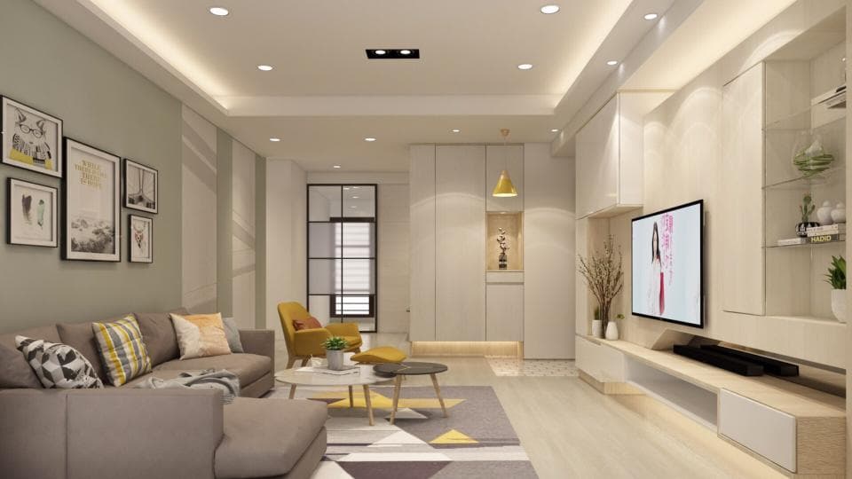 這張「客廳」的照片是一個現代化的客廳,有著灰色的沙發和一個大型的電視牆。牆上裝飾著一些藝術品。