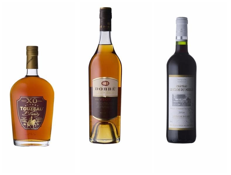 這張「酒類」的照片是三瓶不同的酒,分別是白蘭地、白酒和紅酒。