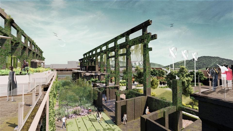 這張「綠色建築」的照片是一個覆蓋著植物的建築,它擁有一個開放式的空間,並有一條通往另一個建築的走廊。