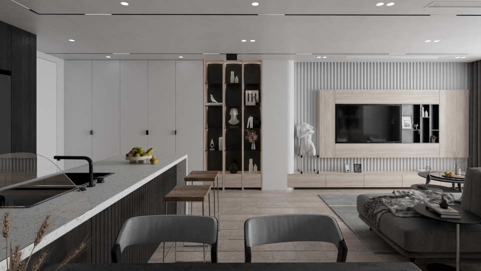 這張照片是一個現代化的廚房和客廳,最重要的是開放式的廚房設計,包含一個寬敞的島臺,上面擺放著一盤水果。