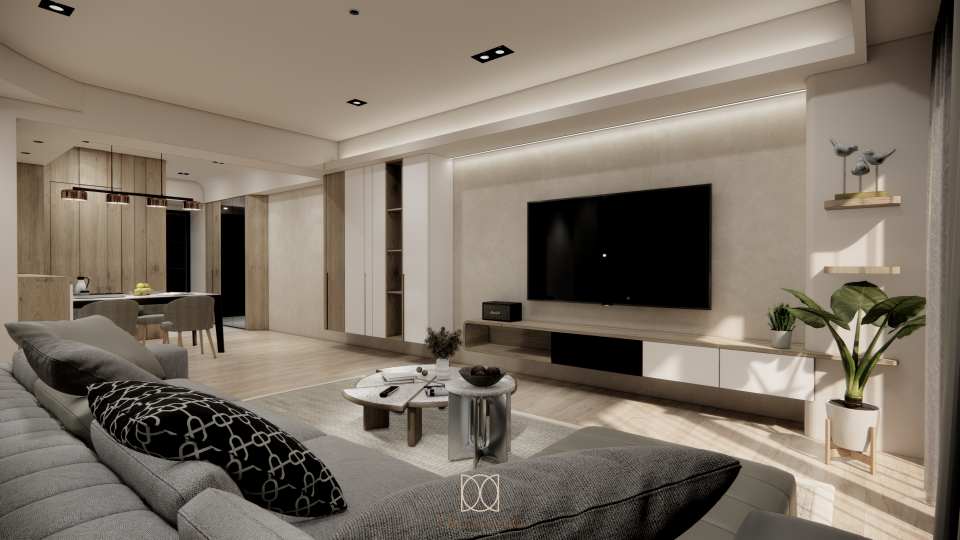 這張客廳的照片是一個現代風格的空間,有灰色沙發、木質地板、以及一個大的電視牆,牆上擺放著綠色植物。