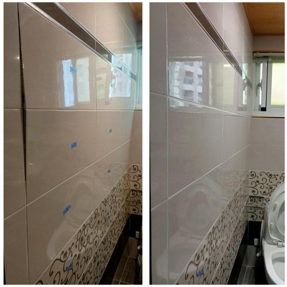 1) 照片顯示一個浴室,牆壁上有瓷磚,地板上有花紋的瓷磚