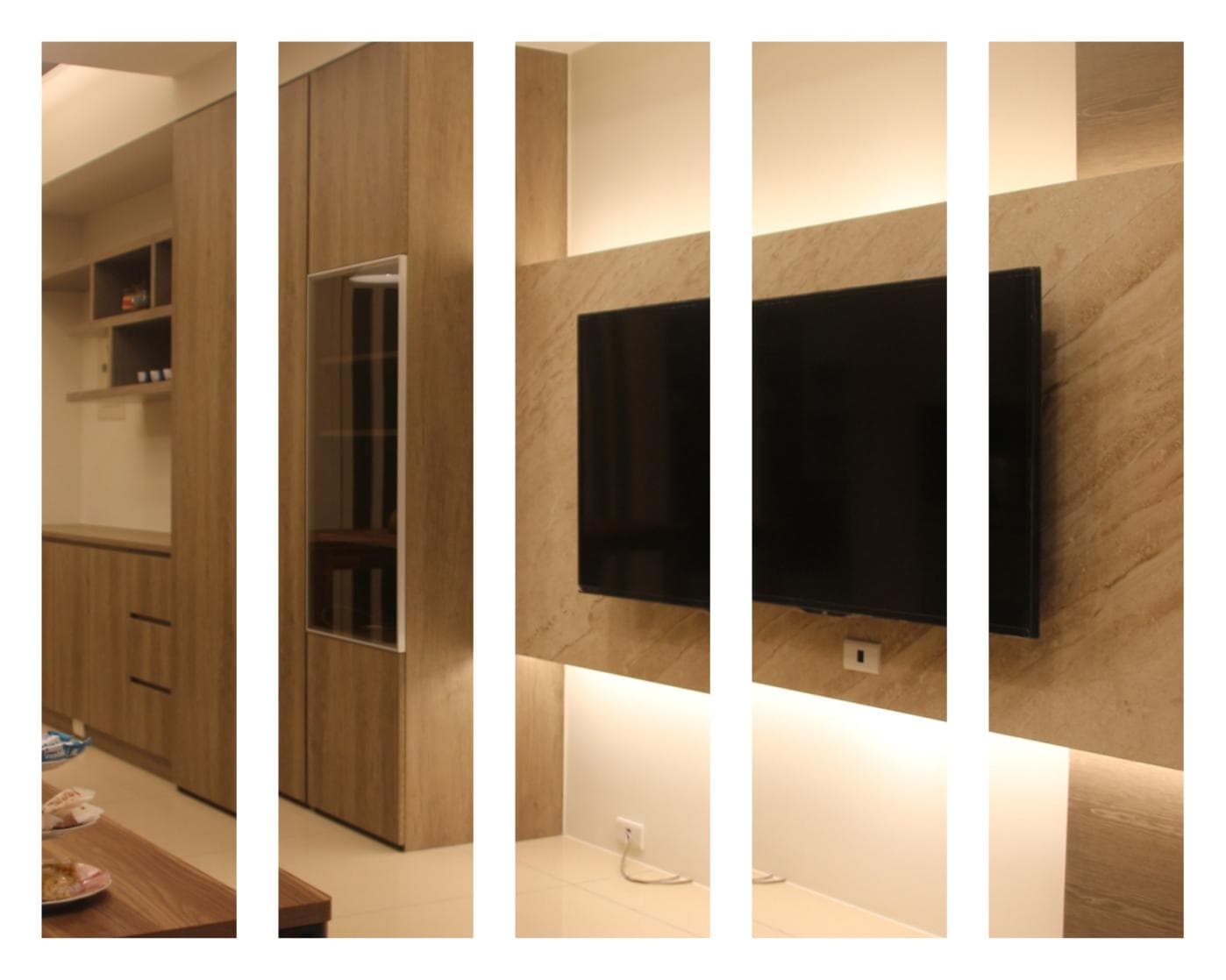 這張照片是現代化客廳的電視牆,以木紋裝飾板搭配隱藏式燈光設計,營造出簡約時尚的氛圍。牆上掛著一臺大型電視,旁邊設有櫃子,整體設計非常美觀實用。