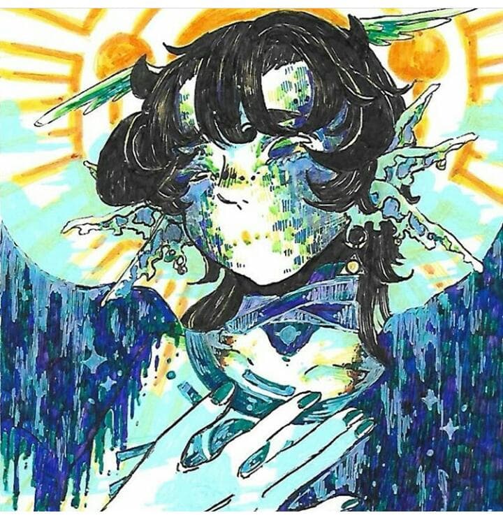 1) 照片描繪了一個有著藍色和綠色色調的幻想生物